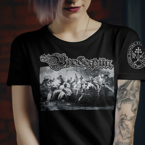 A woman wearing a black short-sleeve graphic T-shirt with a large black-and-white 'Brodequin' band print on the front and a circular white emblem on the sleeve, photographed against a dark brick wall background.