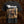 A meticulously crafted tee featuring the infamous “Festival of Death” album cover—an authentic woodcut-style depiction of judicial torture—on the front, and a detailed rendition of the tray card artwork on the back; designed for those who demand historical accuracy and uncompromising brutality in their collection.