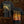 Black short-sleeve Brodequin band t-shirt showing both front and back designs for the metal band Brodequin. The front features their 'Harbinger of Woe' album artwork, and the back displays the 'Harbinger of Woe' artwork in a fiery red, orange, and yellow palette with gothic lettering.