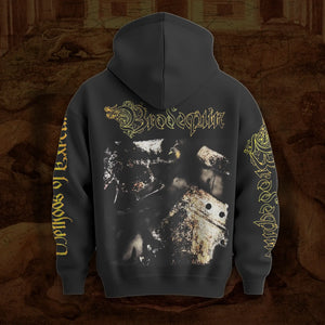 A black hoodie shown from the back, featuring a large graphic print with the word 'Brodequin' in ornate gold lettering above a black-and-white distressed image, plus gold text running down both sleeves. The hoodie is centered against a textured brown background.